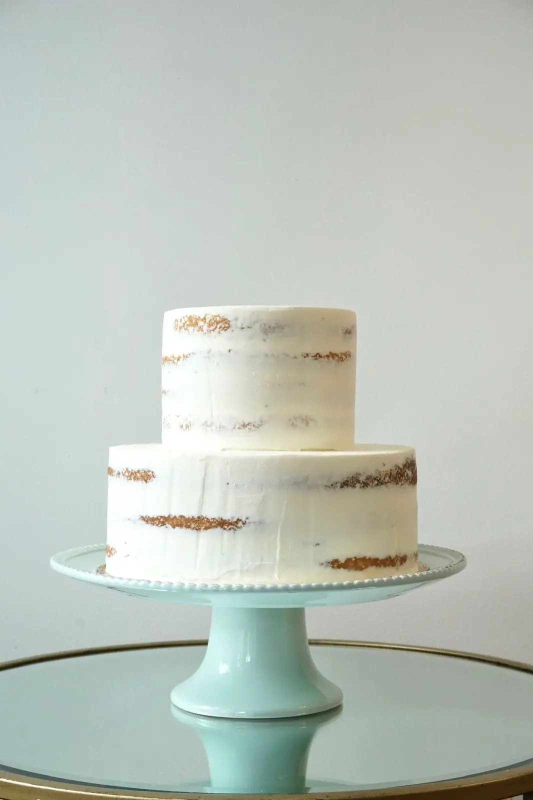 Two-tier Simple Celebration cake with smooth white buttercream